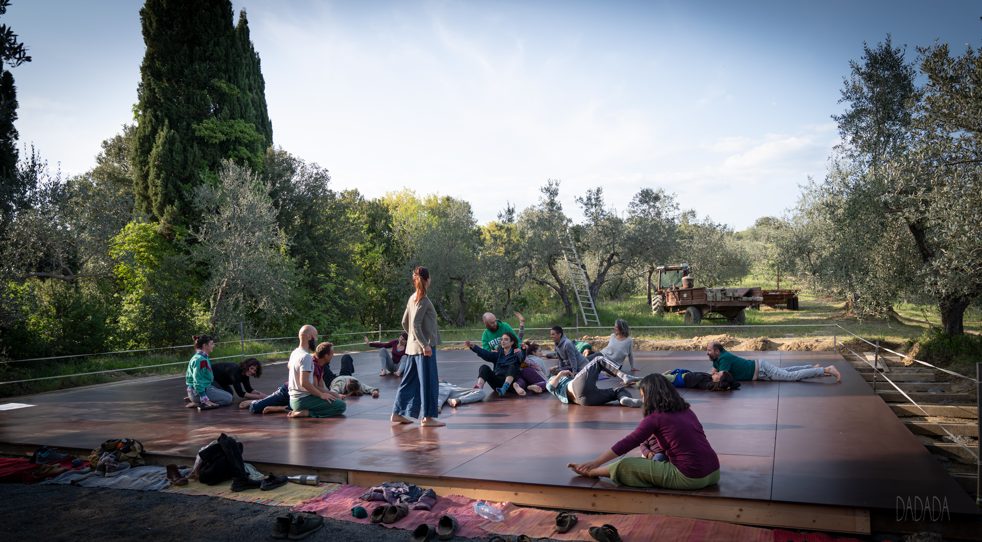 People doing contact dance improvisation in the nature